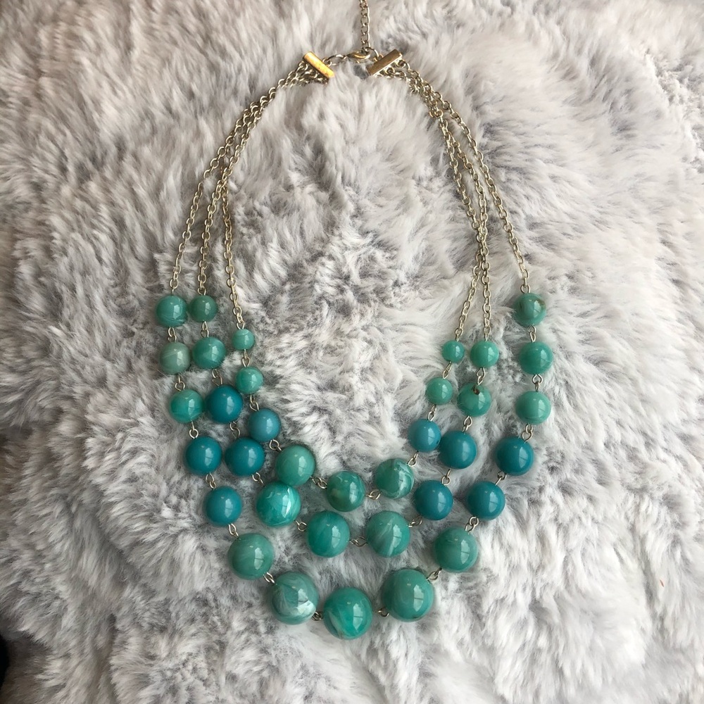 Turquoise color bead triple strand necklace